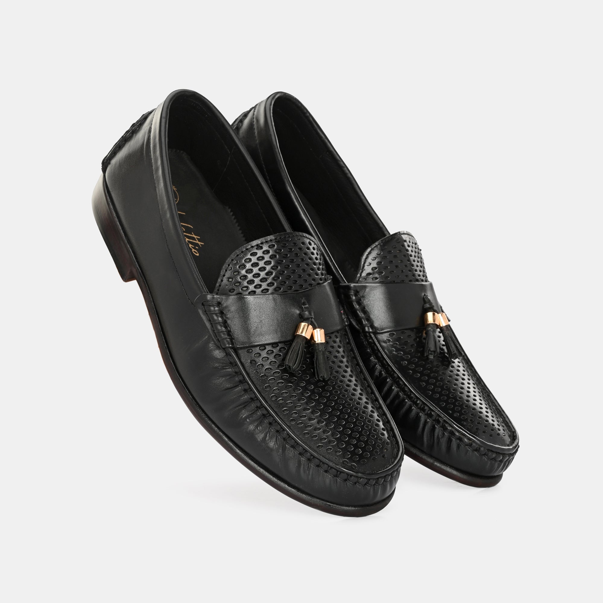 Black Perforated Tassel Loafers by Lafattio