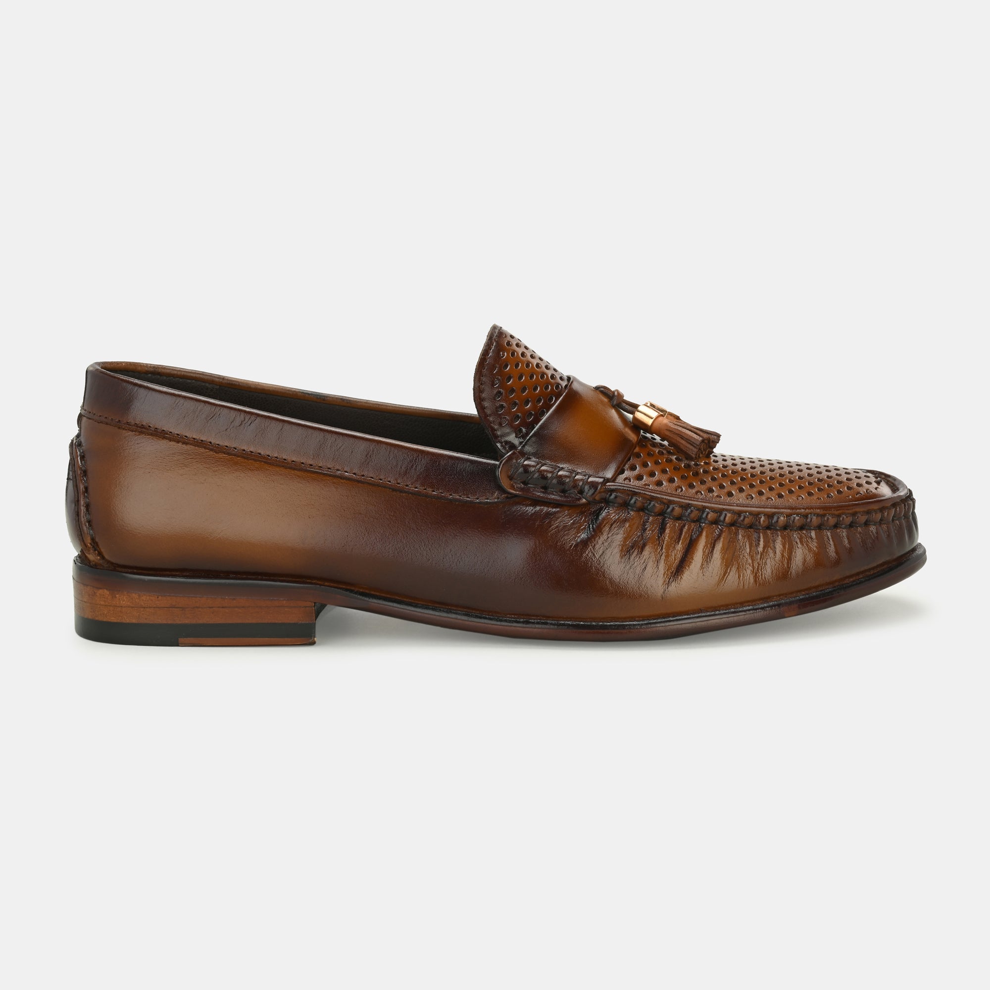 Tan Perforated Tassel Loafers by Lafattio